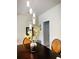 Bright dining room with wainscoting and a stylish centerpiece at 2555 Flat Shoals Rd Apt # 3305, College Park, GA 30349