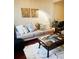 Light and airy living room, featuring hardwood floors and neutral decor at 2555 Flat Shoals Rd Apt # 3305, College Park, GA 30349
