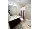 Clean bathroom with a tub, shower, and updated vanity at 2555 Flat Shoals Rd Apt # 3305, College Park, GA 30349