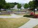 Community playground with swings and play structures at 2555 Flat Shoals Rd Apt # 3305, College Park, GA 30349