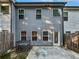 Private backyard patio with a grey concrete slab at 5120 Lower Elm St, Atlanta, GA 30349