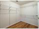 Spacious walk-in closet with ample shelving and hanging space at 2505 Westchester Way, Conyers, GA 30013
