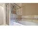Spa-like bathroom featuring a large shower and a relaxing bathtub at 2505 Westchester Way, Conyers, GA 30013