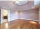 Large bedroom with hardwood floors and ensuite bathroom access at 2505 Westchester Way, Conyers, GA 30013