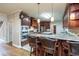 Island kitchen with granite countertops and breakfast bar at 2505 Westchester Way, Conyers, GA 30013