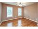 Bright bedroom with hardwood floors and plenty of natural light at 2505 Westchester Way, Conyers, GA 30013