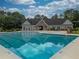 Community pool with a clubhouse and plenty of space for relaxation at 2505 Westchester Way, Conyers, GA 30013