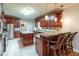 Gourmet kitchen with granite counters and custom cabinetry at 2505 Westchester Way, Conyers, GA 30013