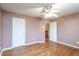 Spacious bedroom with hardwood floors and multiple closets at 2505 Westchester Way, Conyers, GA 30013