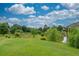 Landscaped backyard with pond, garden, and lush greenery at 2505 Westchester Way, Conyers, GA 30013