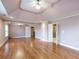 Large bedroom with hardwood floors and ensuite bathroom access at 2505 Westchester Way, Conyers, GA 30013