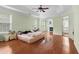 Main bedroom with hardwood floors and fireplace at 1812 Beckley Nw Pl, Kennesaw, GA 30152