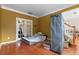 Small room with hardwood floors and access to the backyard at 1812 Beckley Nw Pl, Kennesaw, GA 30152