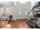 Bright entryway with hardwood floors and staircase at 1812 Beckley Nw Pl, Kennesaw, GA 30152