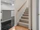Carpeted staircase leading down to the basement at 1812 Beckley Nw Pl, Kennesaw, GA 30152