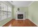 Living room with hardwood floors and fireplace at 1812 Beckley Nw Pl, Kennesaw, GA 30152