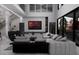 Modern living room boasts a sectional sofa and built-in TV at 612 Saint Christopher Ln, Ellenwood, GA 30294