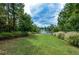 Scenic view of a peaceful lake in the community at 418 Laurel Spring Ct, Canton, GA 30114