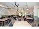 Bright community room with tables and chairs, great natural light at 418 Laurel Spring Ct, Canton, GA 30114