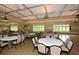 Large banquet hall with many tables and chairs for events at 418 Laurel Spring Ct, Canton, GA 30114