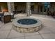 Enjoy evenings by the fire pit on the patio at 418 Laurel Spring Ct, Canton, GA 30114