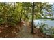 Scenic walking trail alongside a peaceful lake at 418 Laurel Spring Ct, Canton, GA 30114