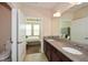 Bathroom with double vanity and view of bedroom at 418 Laurel Spring Ct, Canton, GA 30114