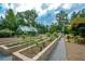 Community garden with raised beds and greenhouse at 418 Laurel Spring Ct, Canton, GA 30114
