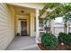 Front porch with rocking chairs, offering a relaxing outdoor space at 418 Laurel Spring Ct, Canton, GA 30114