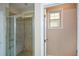 Large walk-in shower with tiled walls and seat at 418 Laurel Spring Ct, Canton, GA 30114