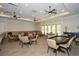 Community game room with tables and chairs for residents at 418 Laurel Spring Ct, Canton, GA 30114