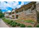 Community building exterior with stone facade and covered porch at 418 Laurel Spring Ct, Canton, GA 30114