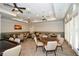 Community game room with tables and chairs for residents at 418 Laurel Spring Ct, Canton, GA 30114