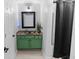 Bathroom with green vanity and shower/tub combo at 2700 Pine Tree Ne Rd # 2108, Atlanta, GA 30324