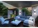 Relaxing covered deck with sectional sofa and coffee table at 748 Charles Allen Dr, Atlanta, GA 30308