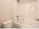 Bathroom with a shower/tub combo and a single vanity at 1761 Morgan Ln, Conyers, GA 30012