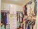 Large walk-in closet with ample shelving and hanging space at 211 Colonial Homes Nw Dr # 2106, Atlanta, GA 30309