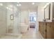 Luxurious bathroom featuring a soaking tub, walk-in shower, and dual vanity at 211 Colonial Homes Nw Dr # 2106, Atlanta, GA 30309