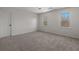 Bright bedroom with neutral walls and carpeting at 2912 Vinings Forest Se Way, Atlanta, GA 30339