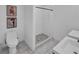 Modern bathroom with a walk-in shower and double vanity at 287 Church St, Dacula, GA 30019