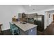 Modern kitchen featuring stainless steel appliances and a spacious island with seating at 287 Church St, Dacula, GA 30019