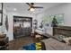 Bright bedroom featuring a walk-in closet and dresser at 287 Church St, Dacula, GA 30019