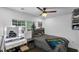 Cozy bedroom with a queen-size bed and vanity at 287 Church St, Dacula, GA 30019
