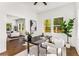 Home office with a desk and two chairs, and hardwood floors at 971 Washington Sw Pl, Atlanta, GA 30314