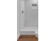 Walk-in shower with marble tile and pebble floor at 5361 N Main St, Acworth, GA 30101
