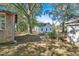 Large backyard with mature trees and a shed at 5361 N Main St, Acworth, GA 30101