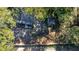 Aerial view of house and yard with wooden fence at 5361 N Main St, Acworth, GA 30101