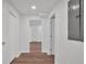 Clean and bright hallway with light wood flooring at 5361 N Main St, Acworth, GA 30101