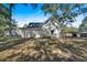 Back of the house with a large backyard and shed at 5361 N Main St, Acworth, GA 30101