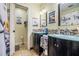 Clean bathroom with double vanity and a shower at 1736 Pleasant Grove Rd, Temple, GA 30179